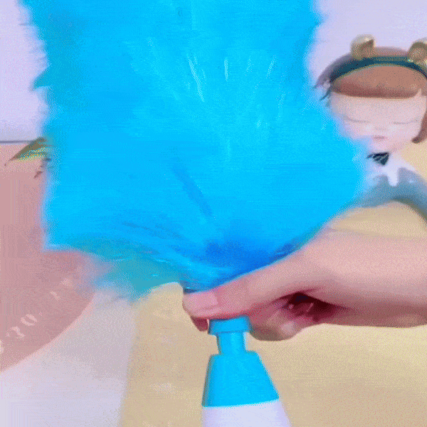 elektrisk støvbørste i brug